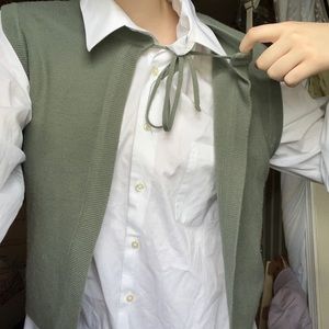 green sweater vest